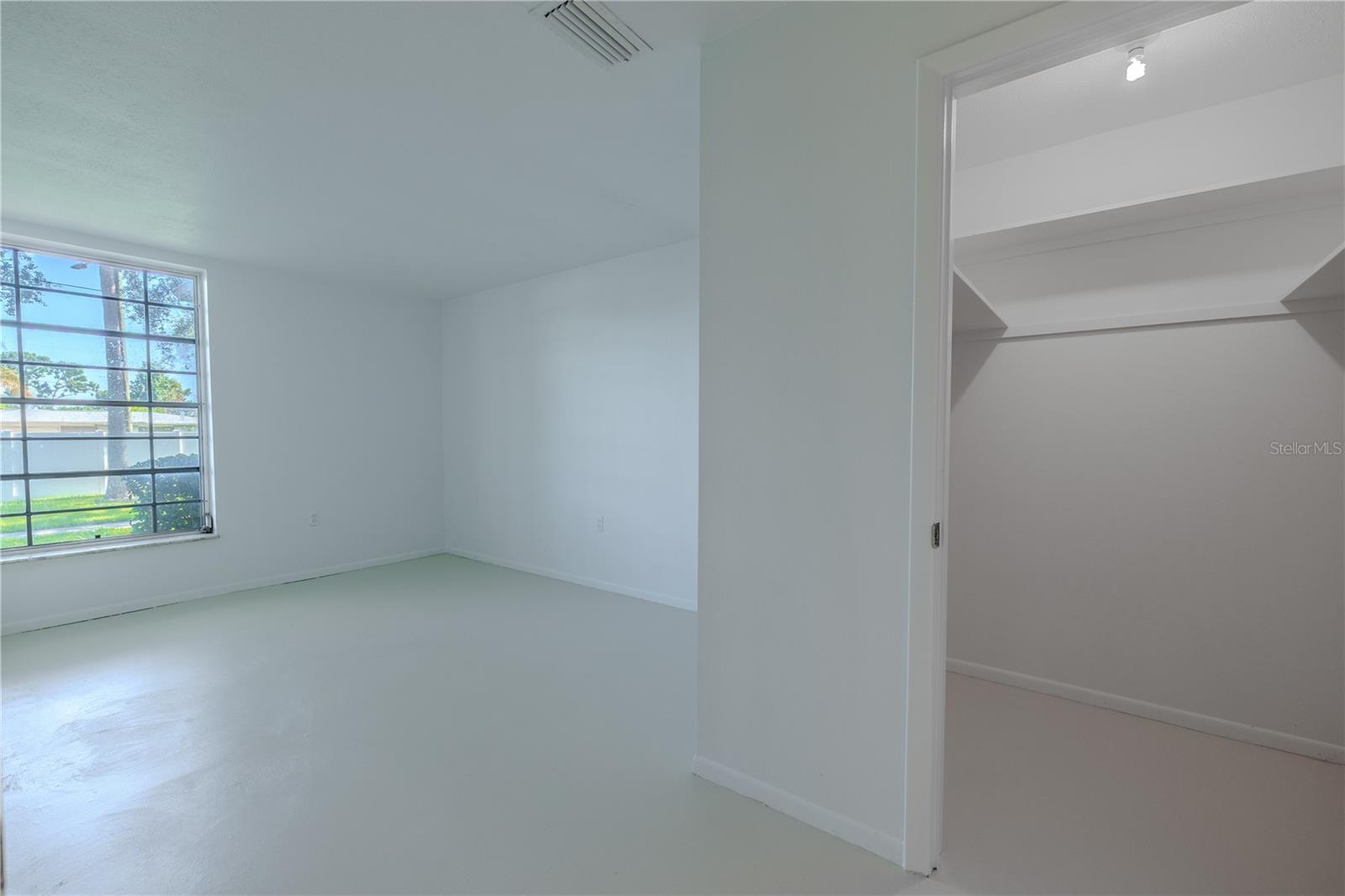 The primary bedroom has a large walk-in closet.
