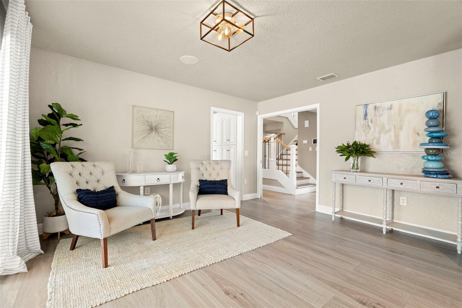 Sitting area off family room can be formal dining room