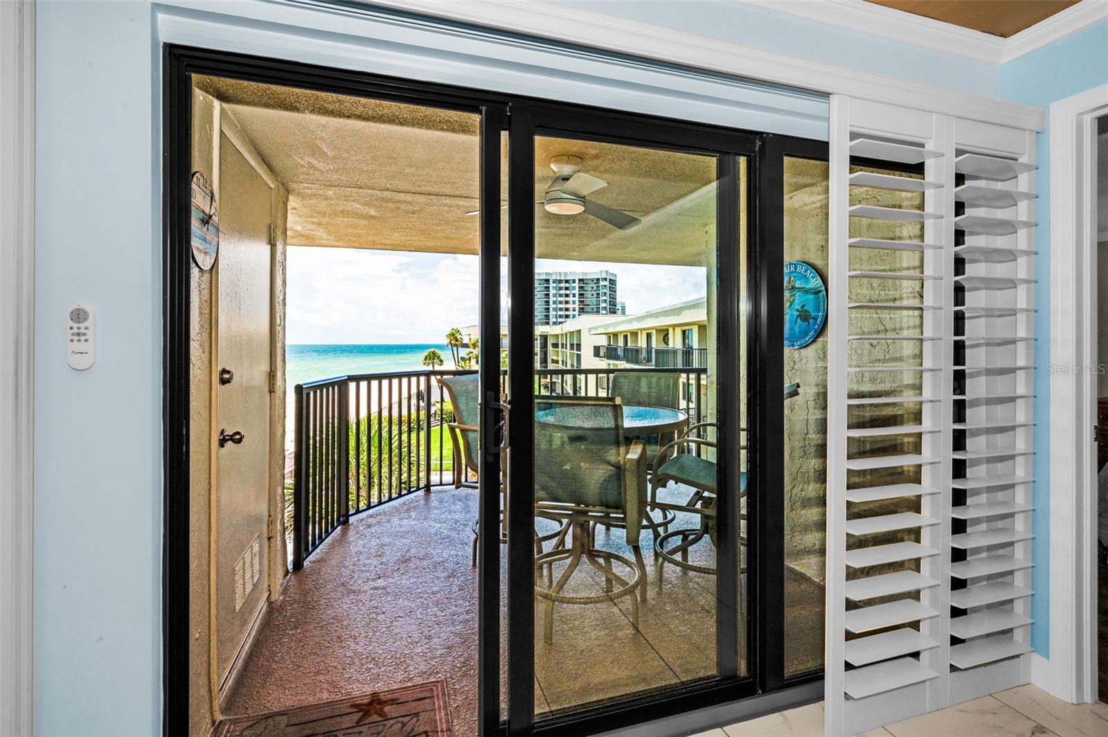 Step through the sliding glass door to the sun drenched balcony overlooking the Gulf!