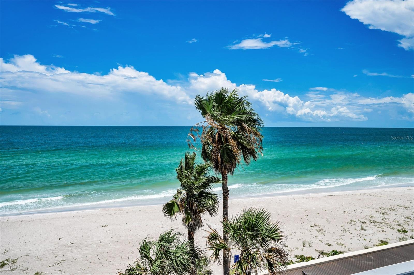 Welcome to your outdoor living room—beach breeze included, epic view guaranteed!