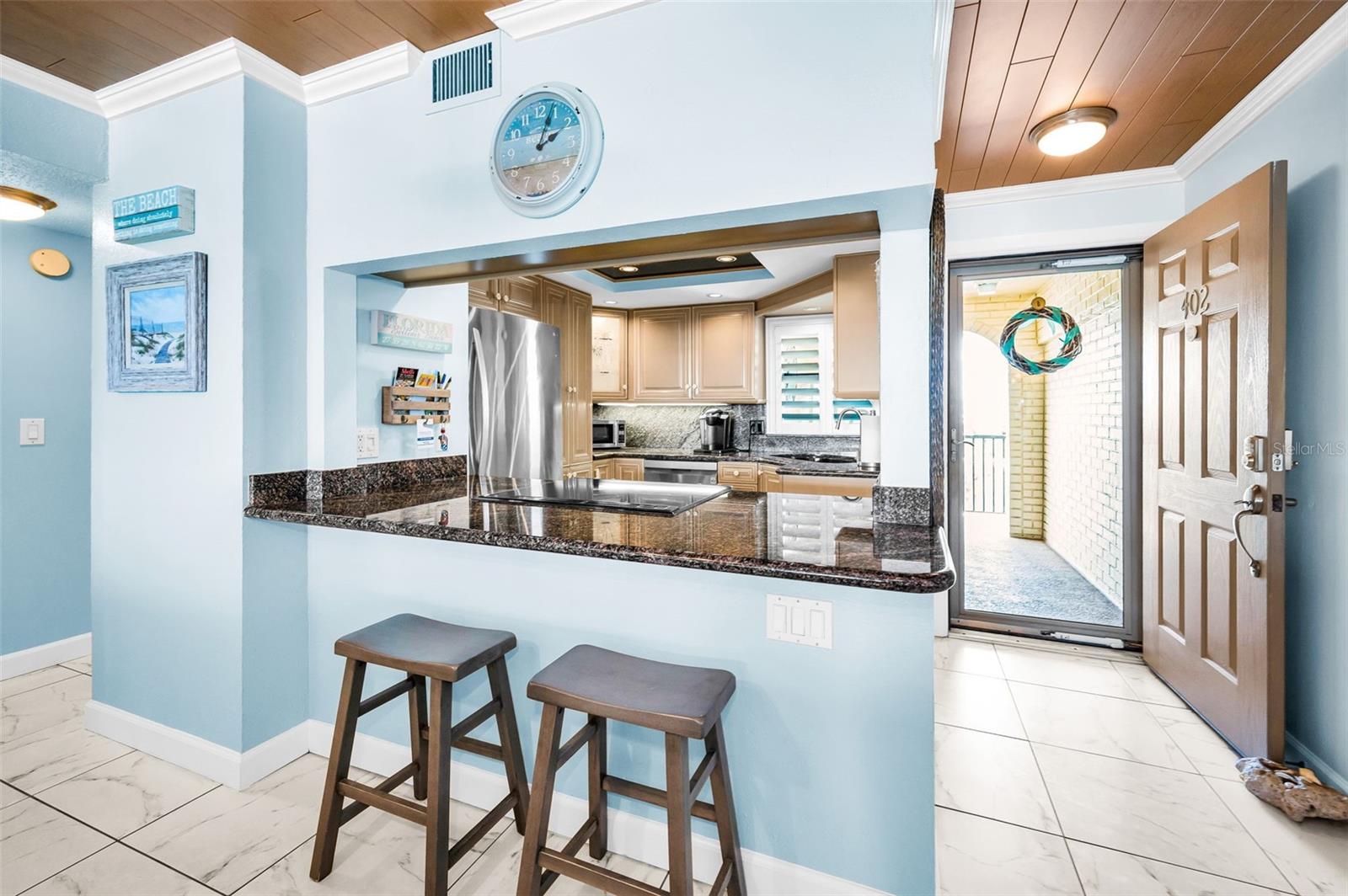 Tucked away yet central to the rhythm of beach living, this charming kitchen offers function without fuss.