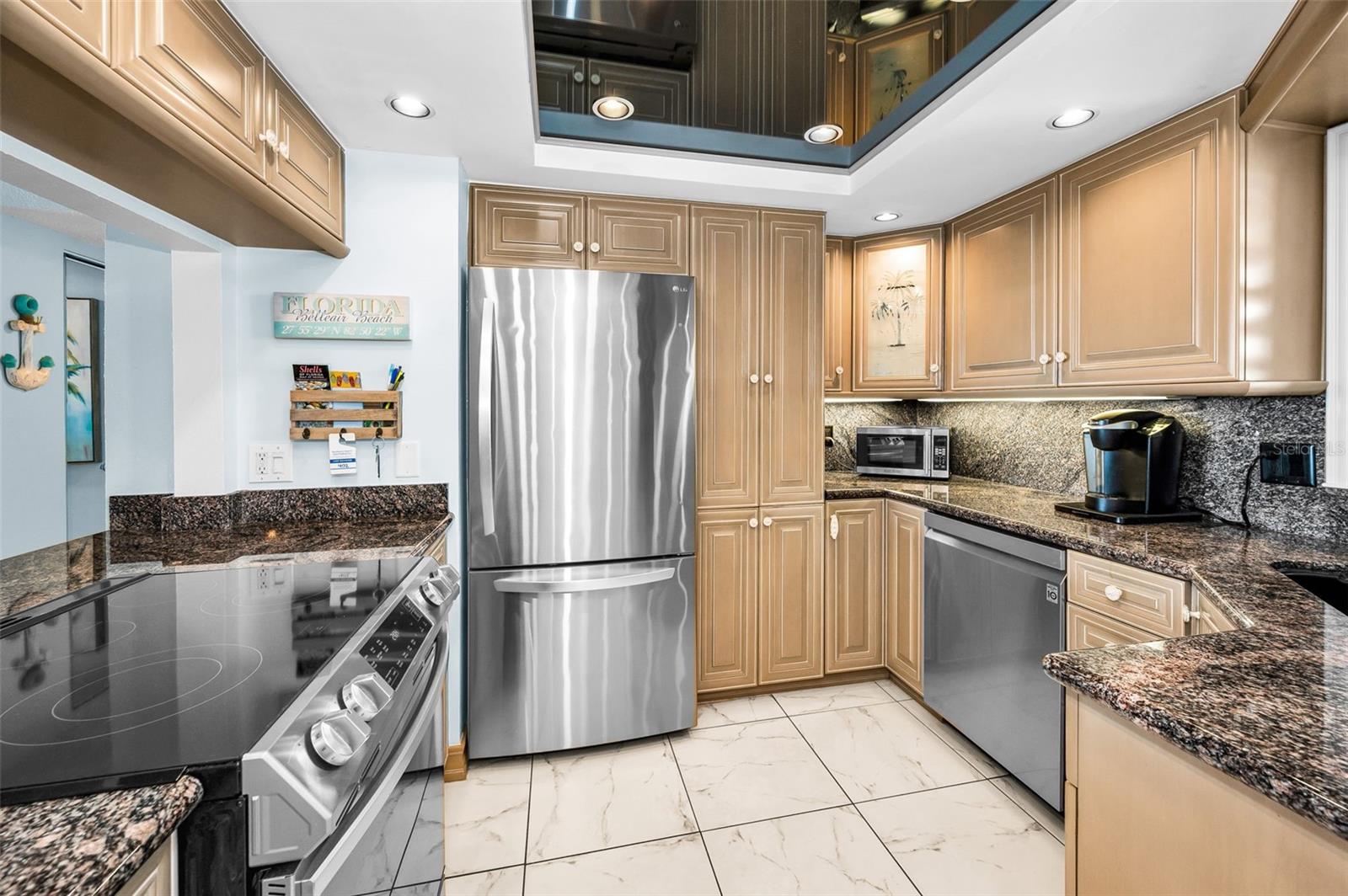 Every ingredient for perfection: premium appliances, ample prep space, and timeless coastal style.