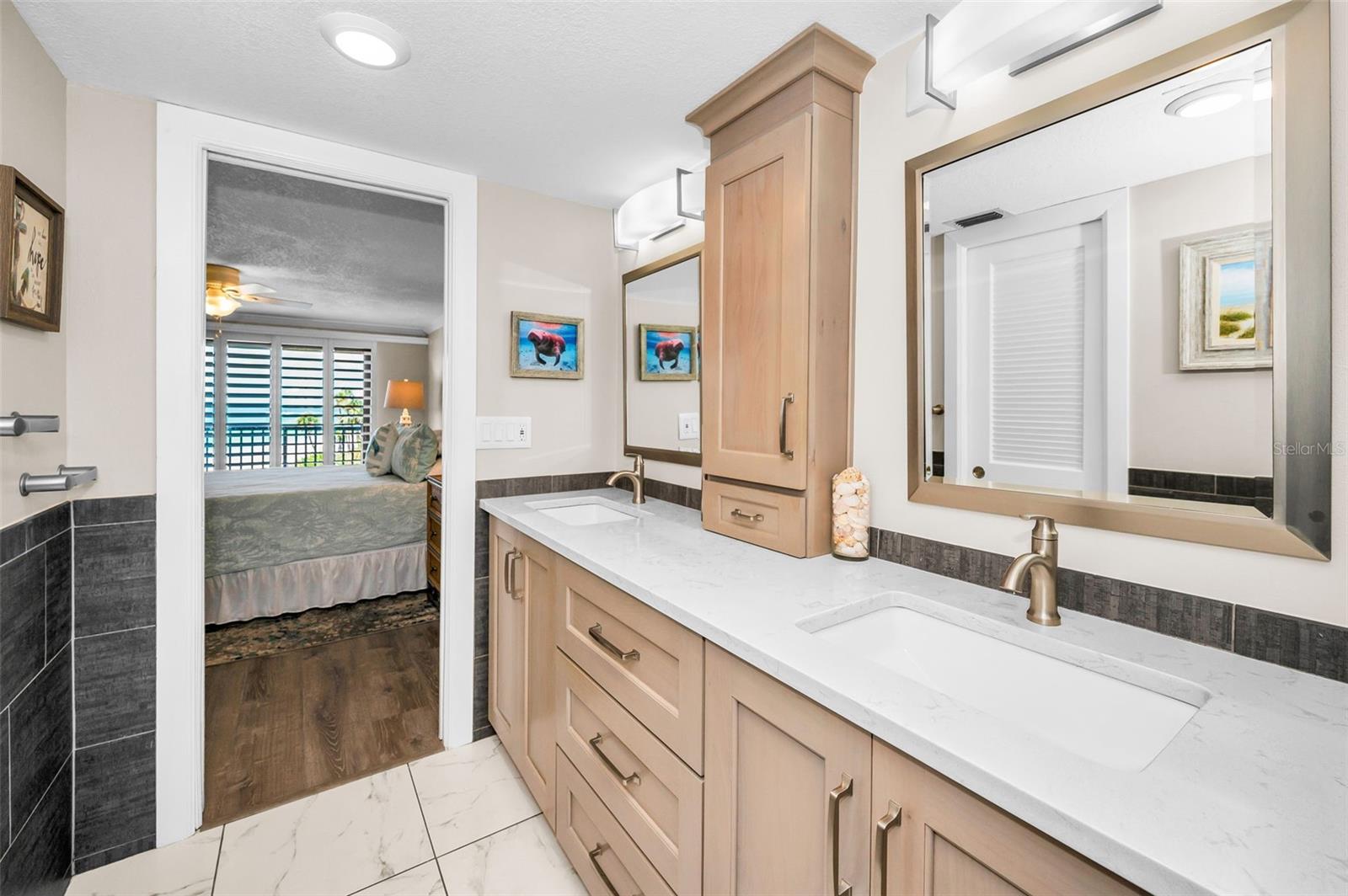 Tile’s gleaming, faucets are sleek, and the mirror’s begging for a good morning selfie