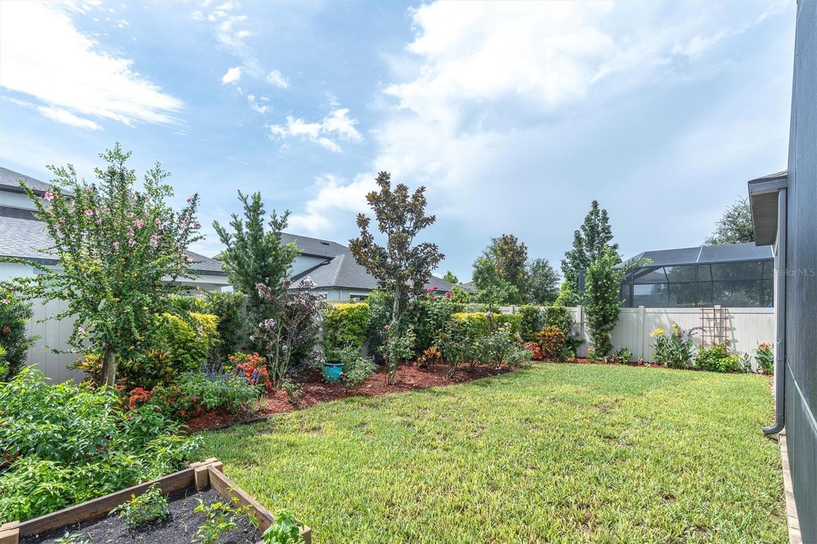 BEAUTIFULLY LANSCAPED FULLY FENCED YARD