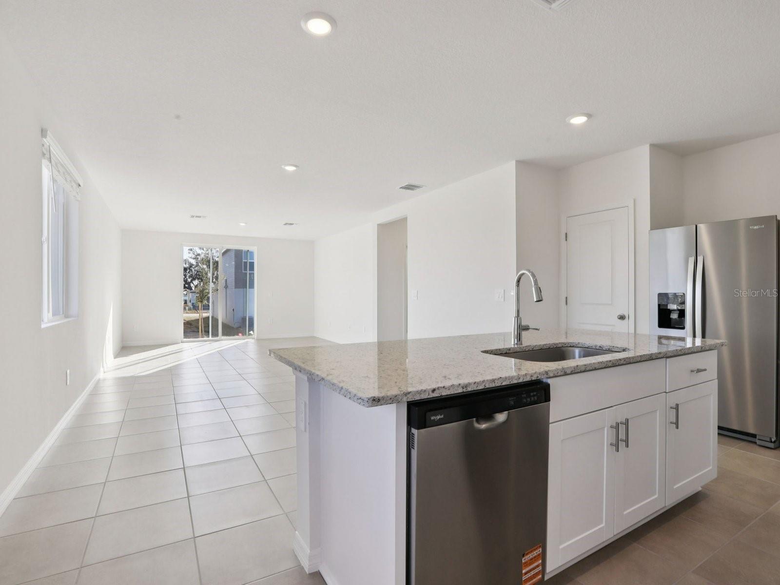 Interior photos are not of the actual home but are photos of the builder home with same floorplan with similar interior finishes and features.