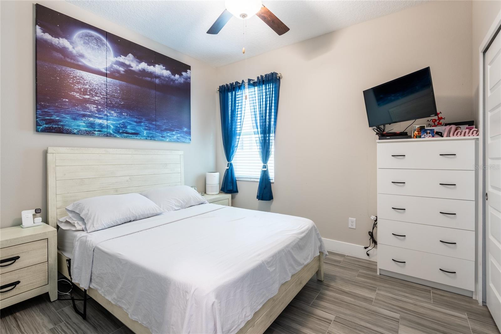 2nd bedroom. Has a built in dresser and custom closet.