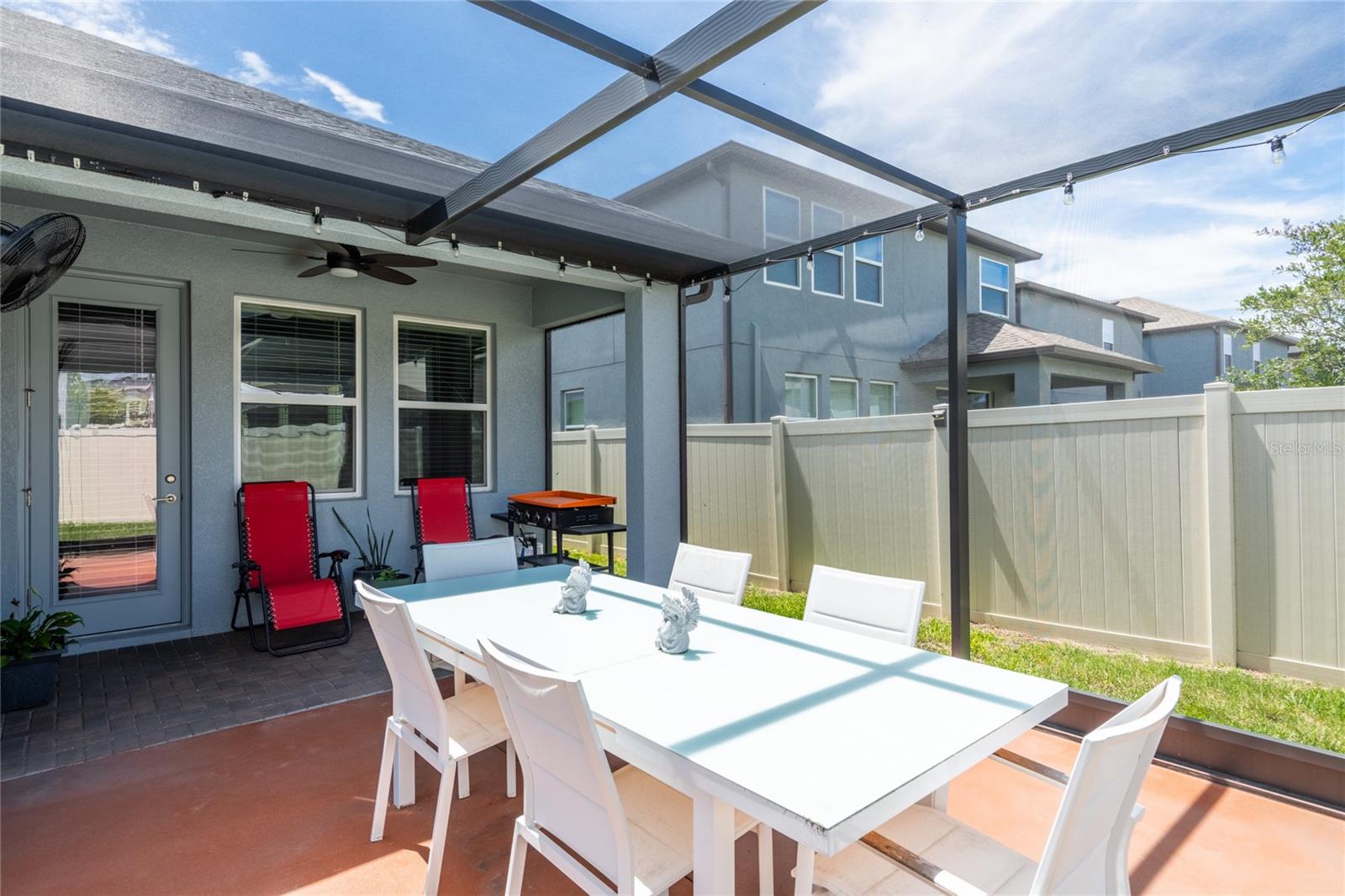 Patio extended to 14 x 21 and screened in.
