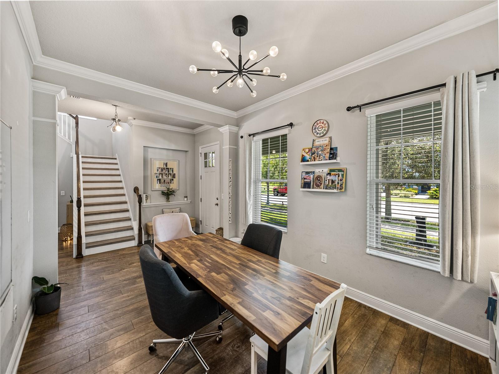 The formal living room or dining room is currently being used for homeschooling
