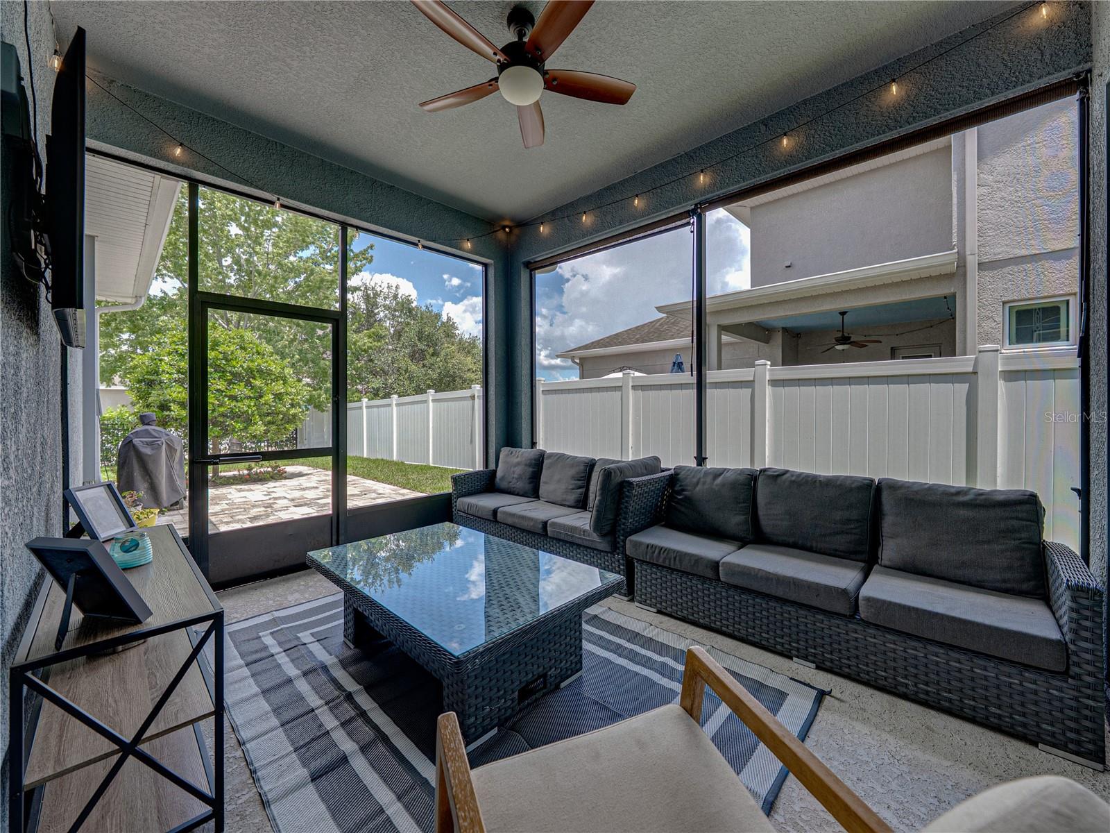 Screened back patio plus outside paver patio