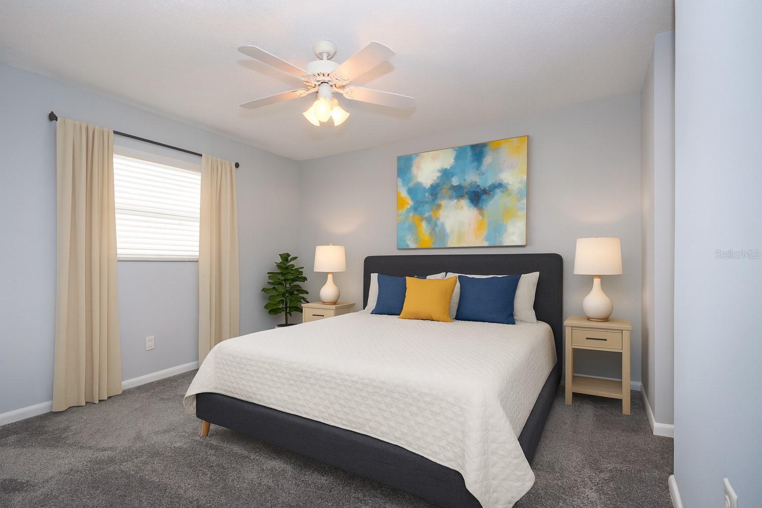 Primary ensuite bedroom (staged)