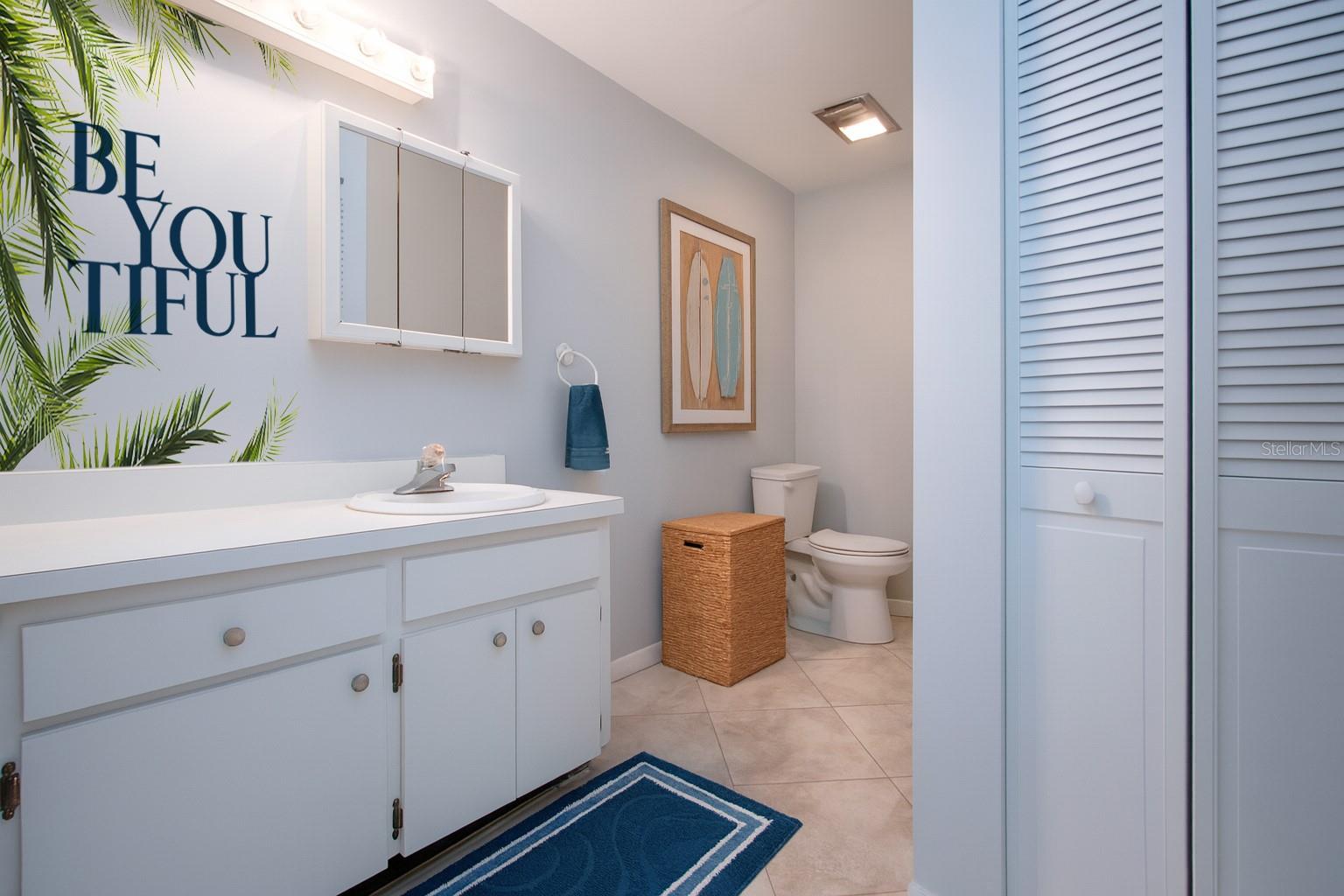 Ensuite primary bathroom (staged)