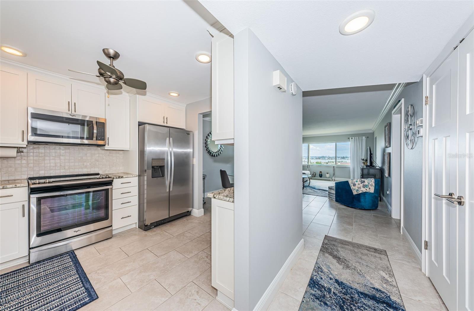 Entry to the condo with the kitchen on the left