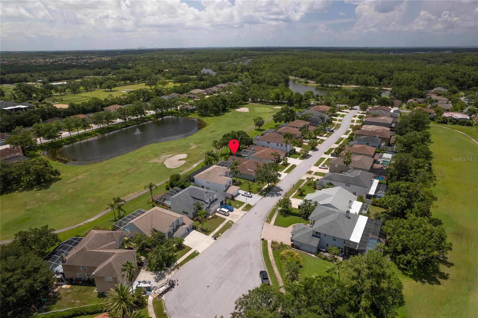 This home is located on a quiet street at the front of the 24 hour guard gated Eagles community