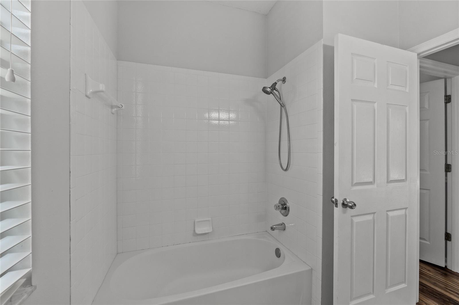 Bathroom 2 located off of the Kitchen between Bedrooms 2 & 3