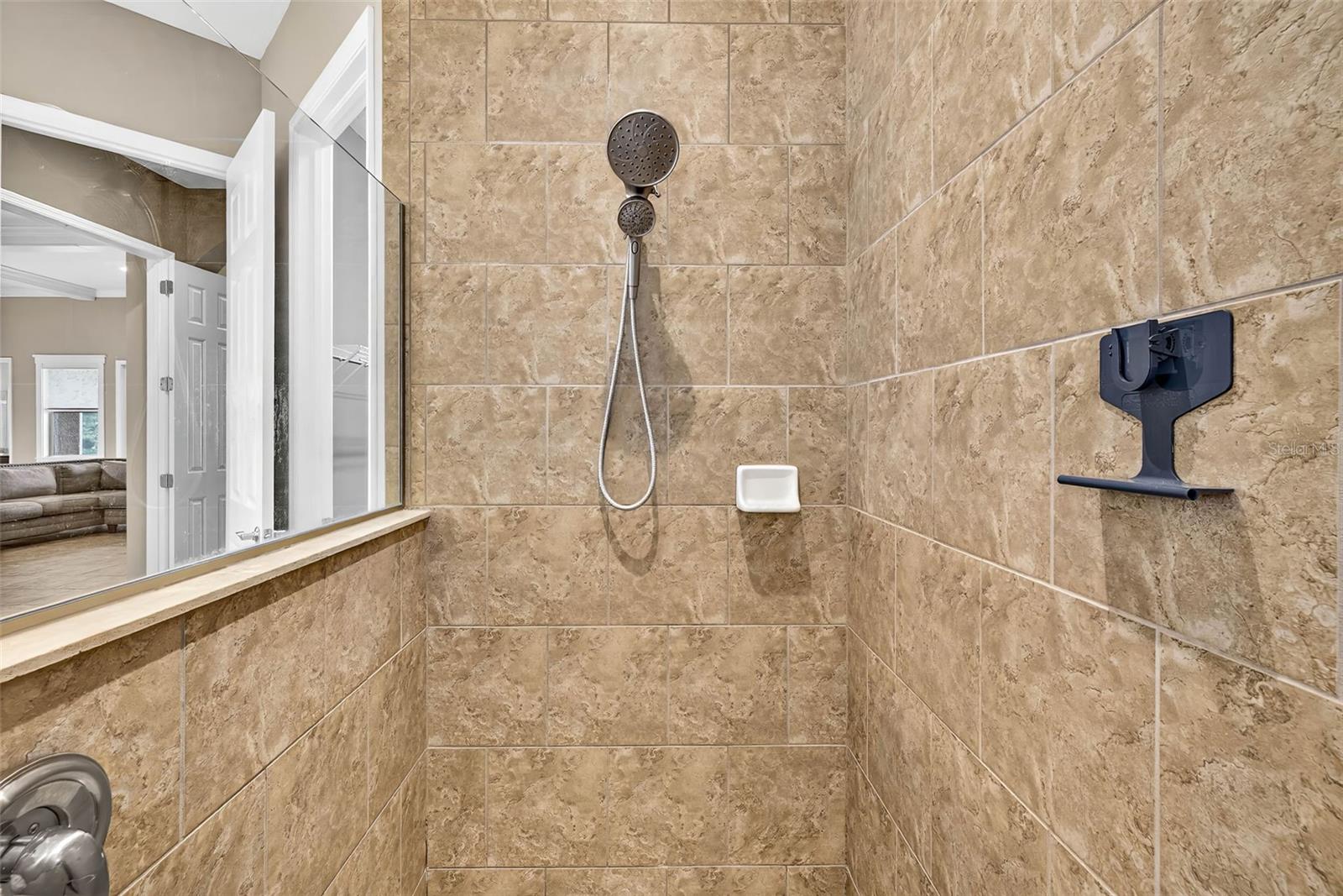 Walk in shower to primary suite