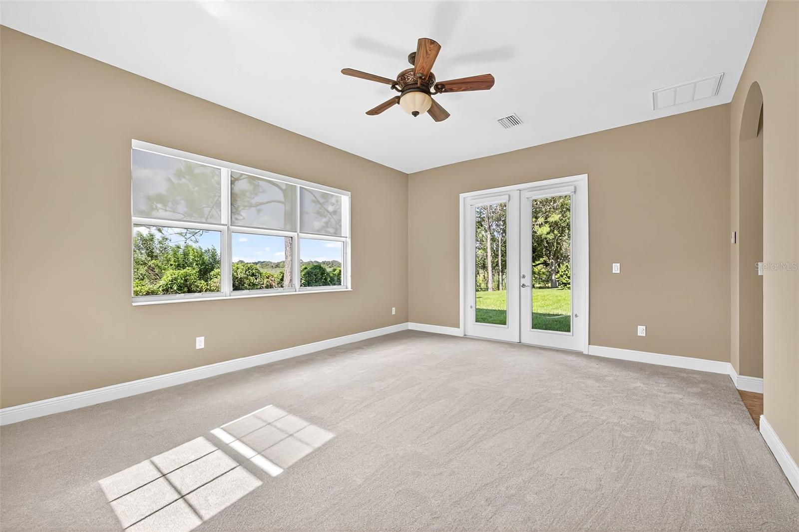 Flex room has access to the backyard- great for an entertaining space.