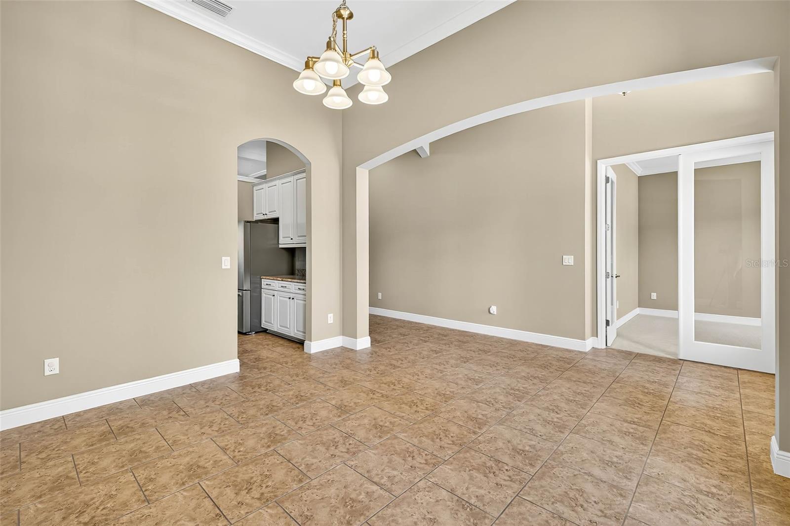 Formal dining area looking toward front flex/office space