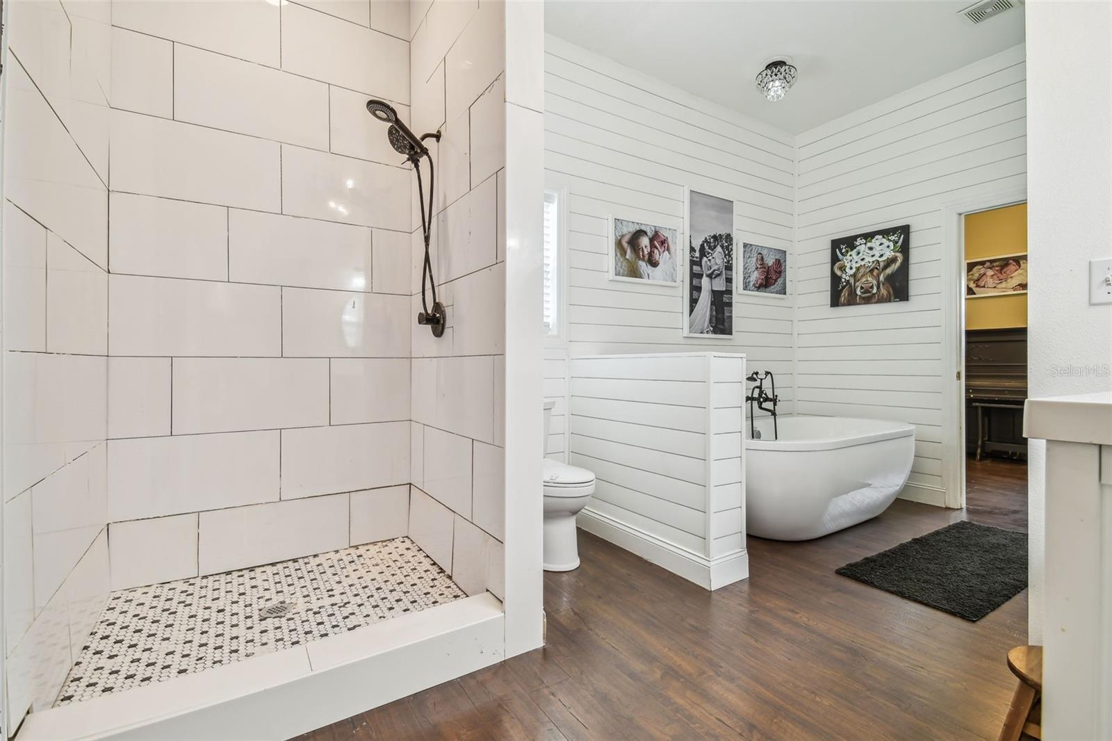 Hall bath in main home with custom shower and soaker tub