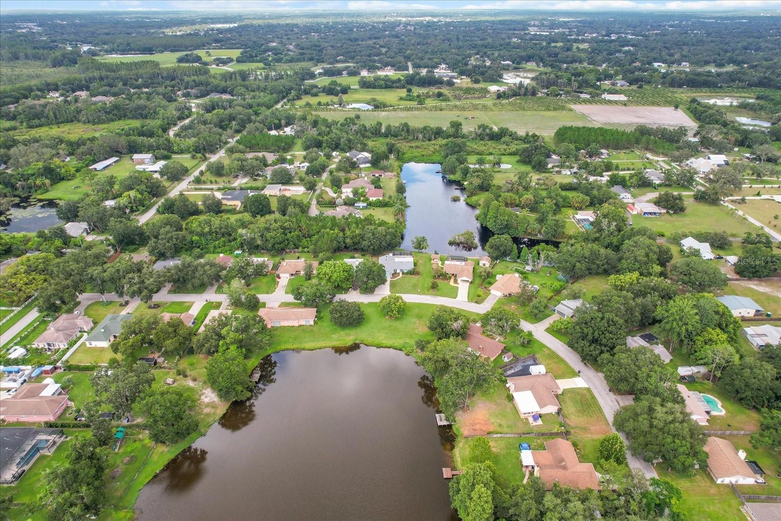 Home is the light colored grey roof between the two lakes