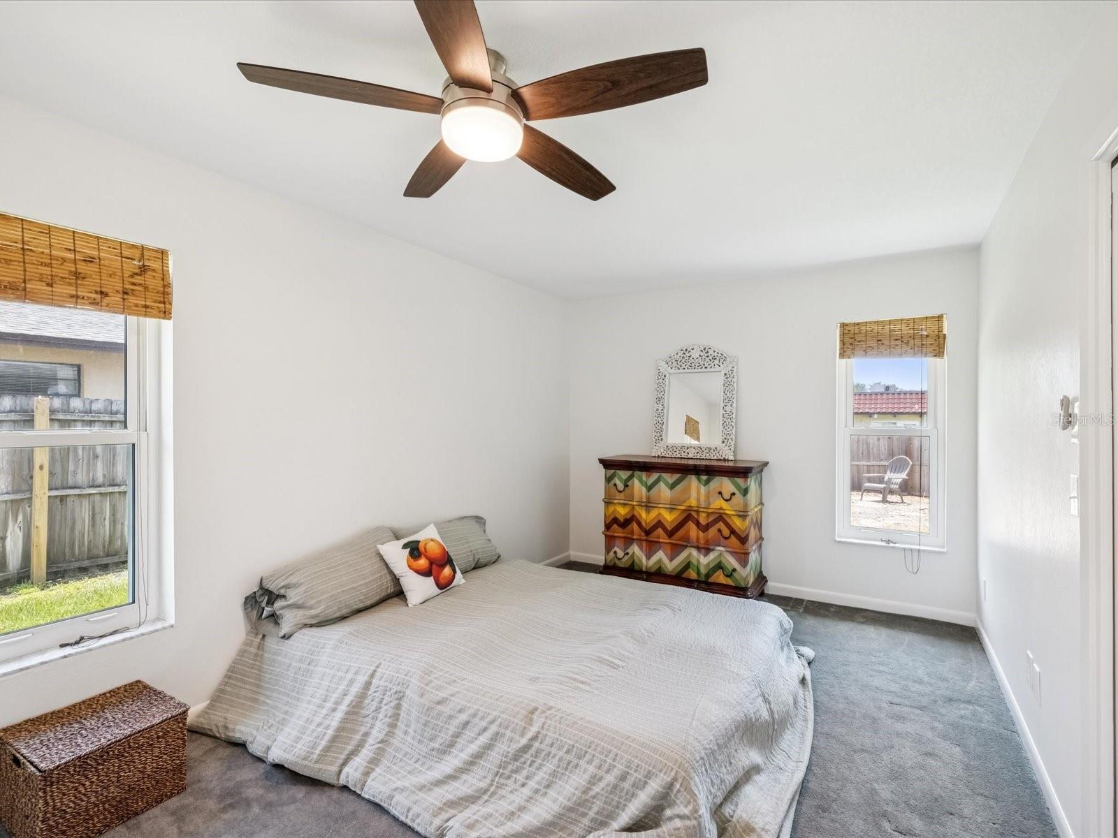 3rd Bedroom overlooks Firepit Area & Side Yard