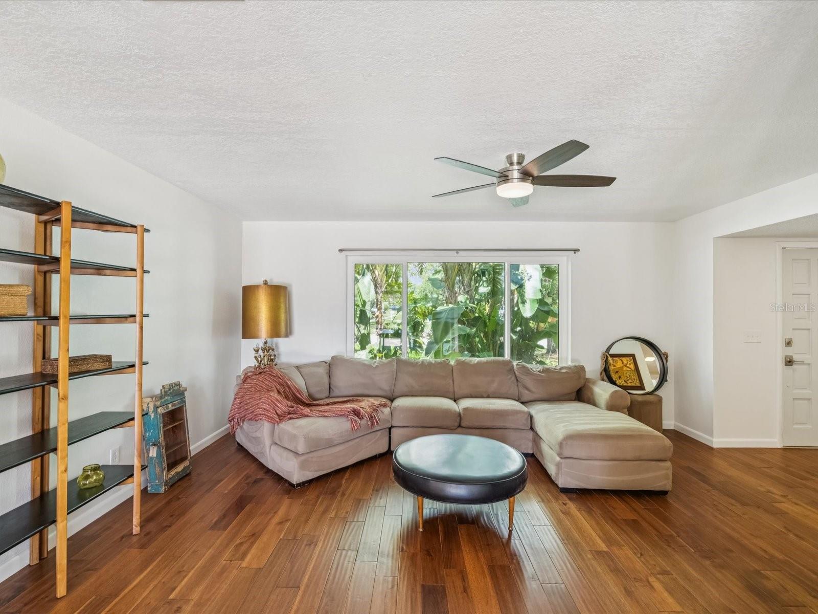Large Living Room w/ Solid Hand scraped Acacia Hardwood Floors