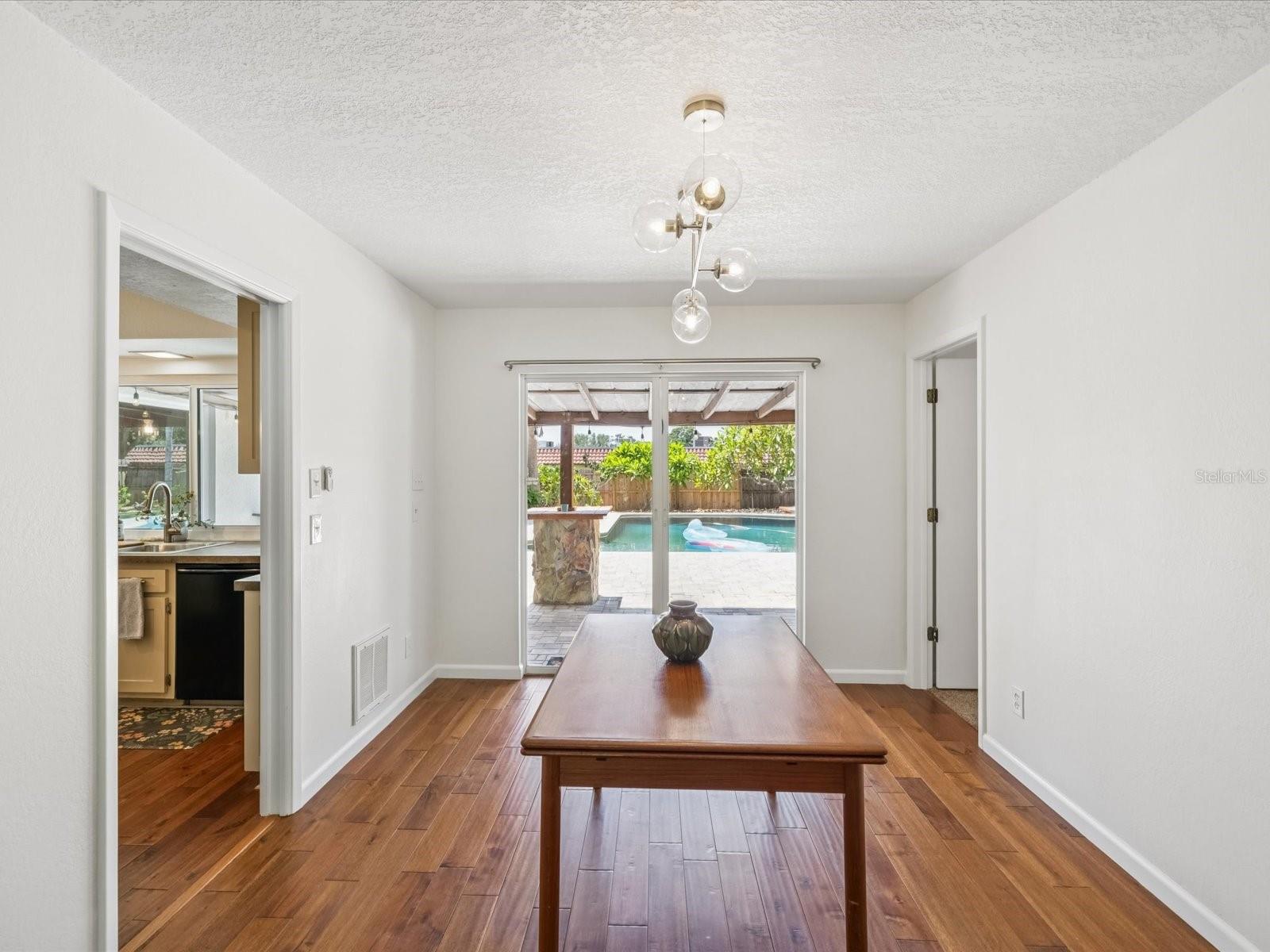 Dining Room overlooking the Beautiful Backyard
