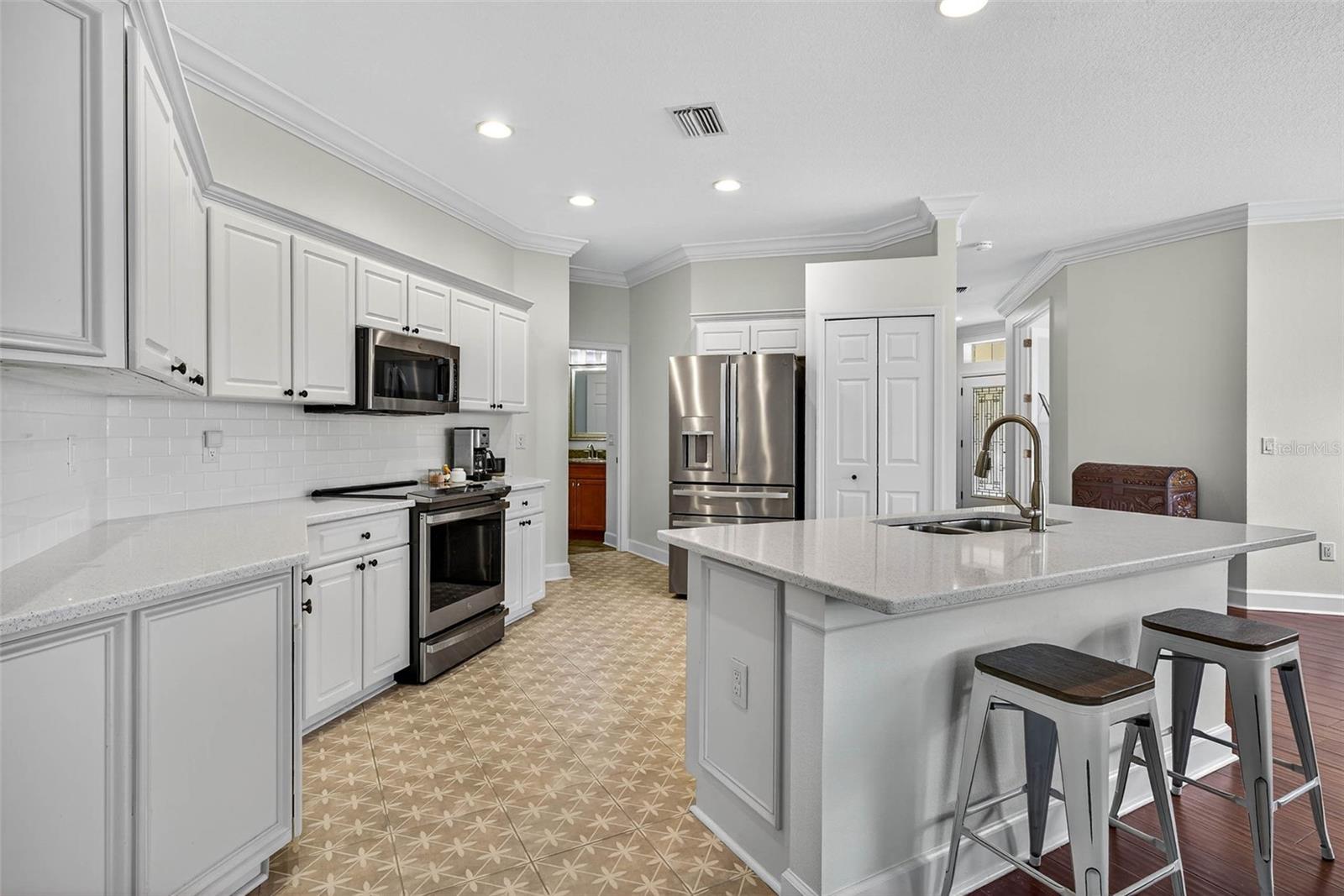 Quartz countertops and stainless appliances