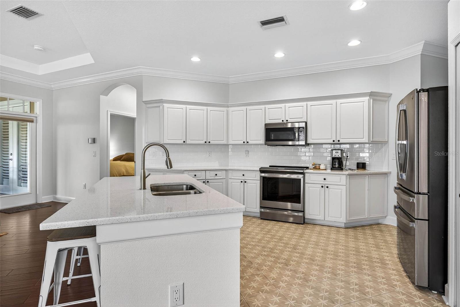 Quartz countertops and stainless appliances
