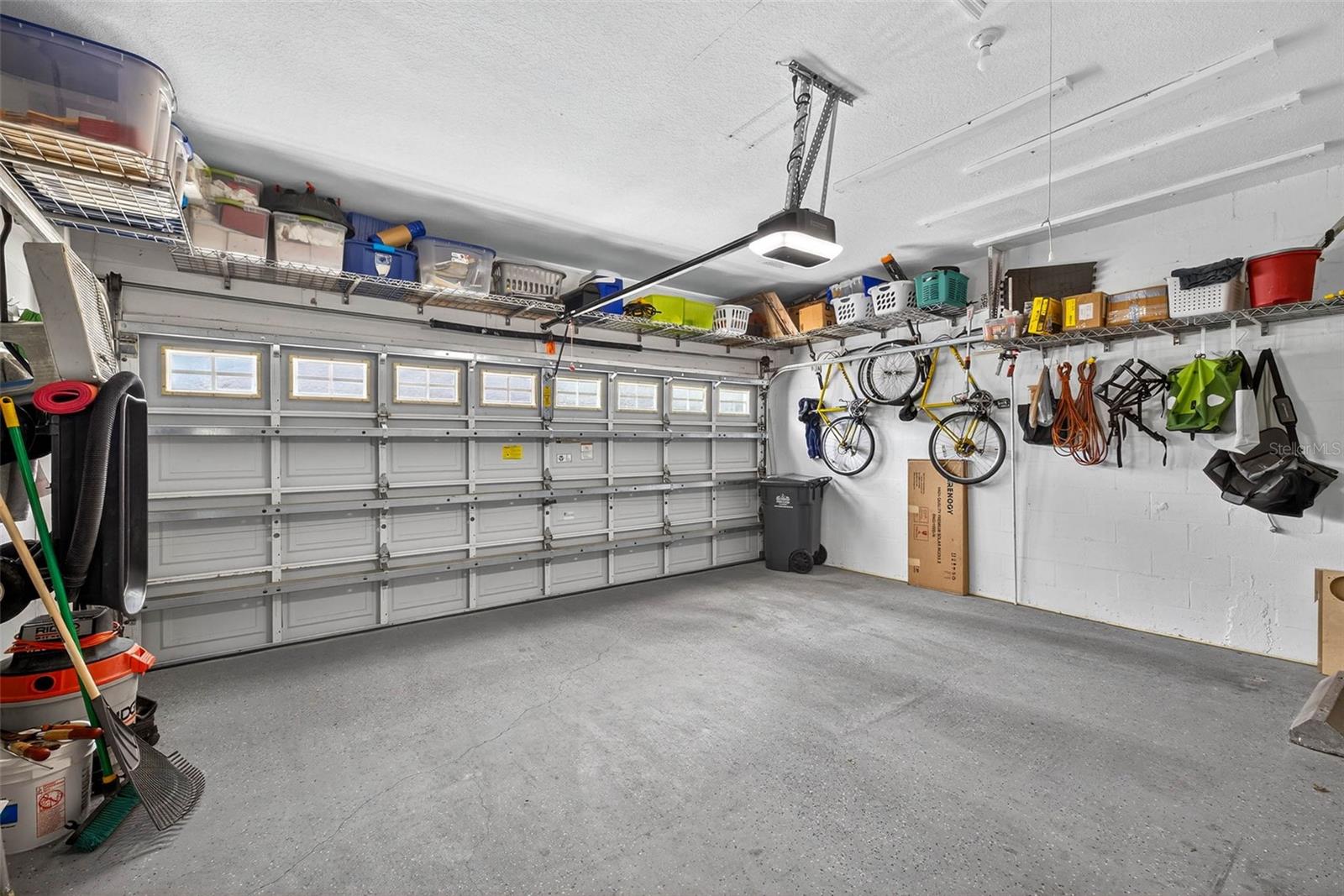 Attached 2-car garage, ally entry