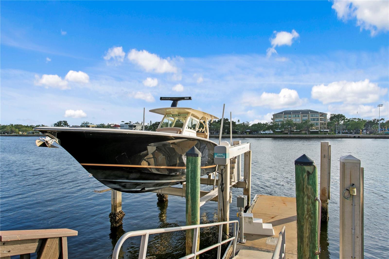 Concrete floating Slip with 14,000 lb. boat lift;