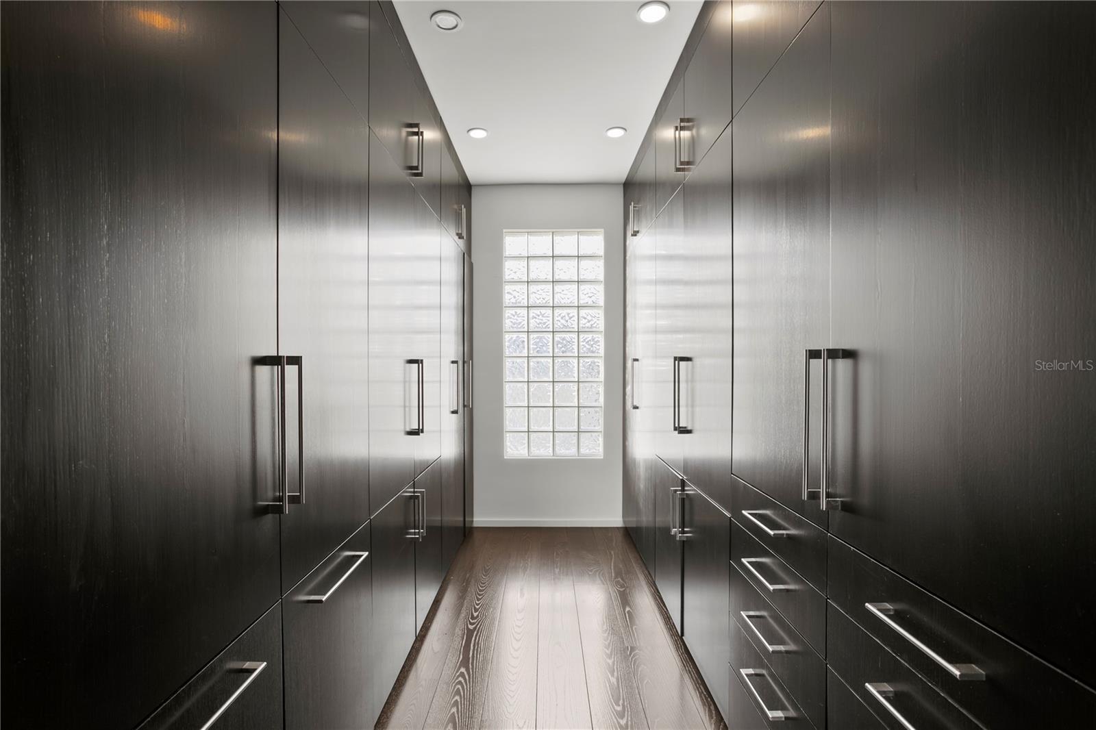 Custom outfitted closet keeps everything neat and tidy