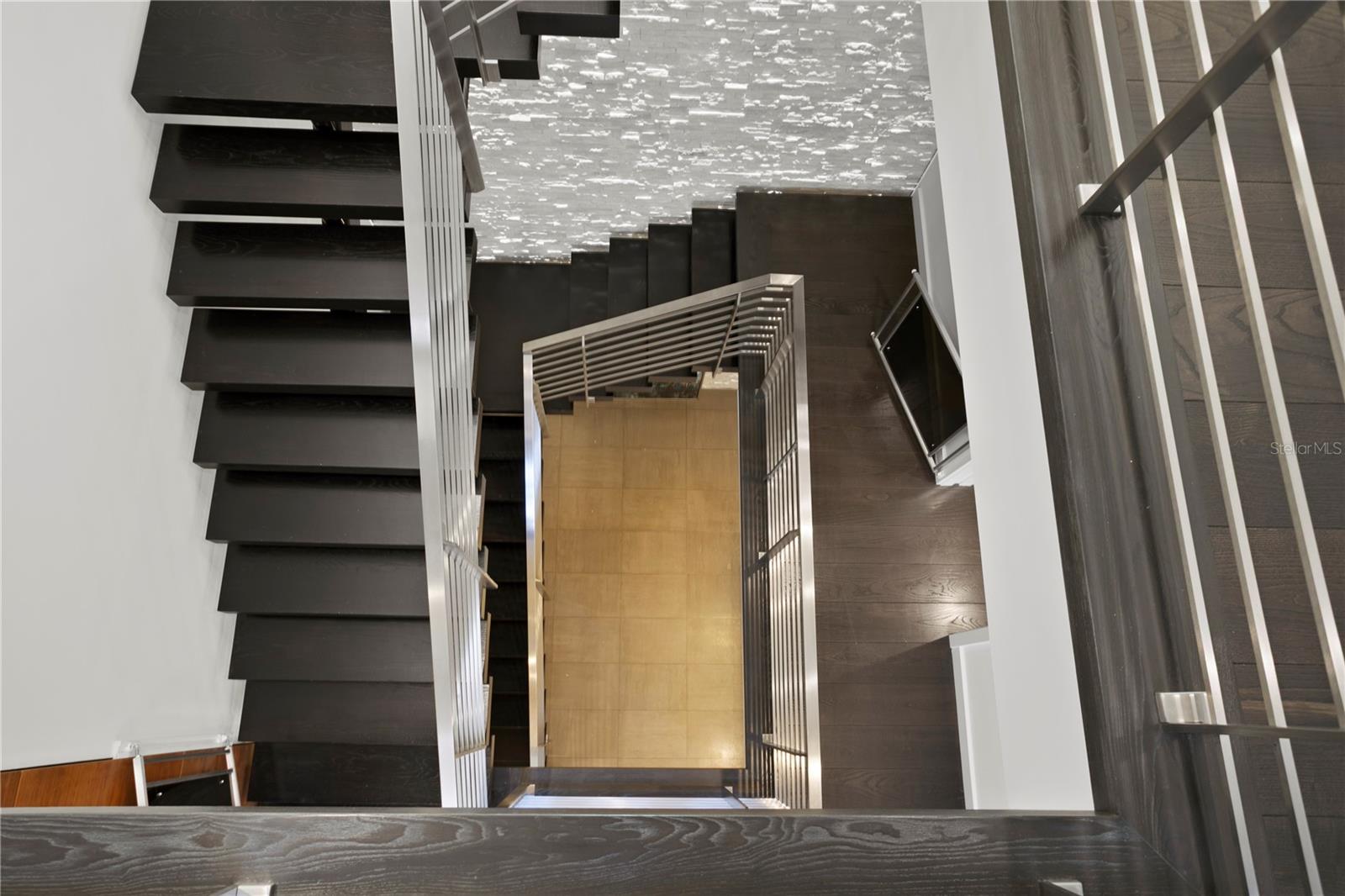 Bird's Eye View from Primary Suite level to ground floor -- Opportunity to add an elevator