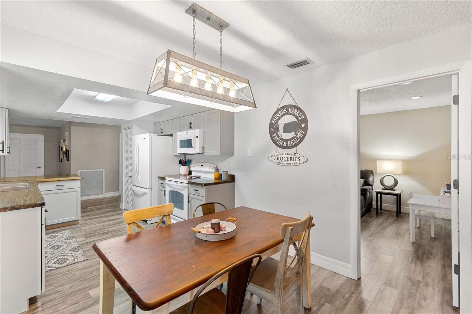 Kitchen with door to media room