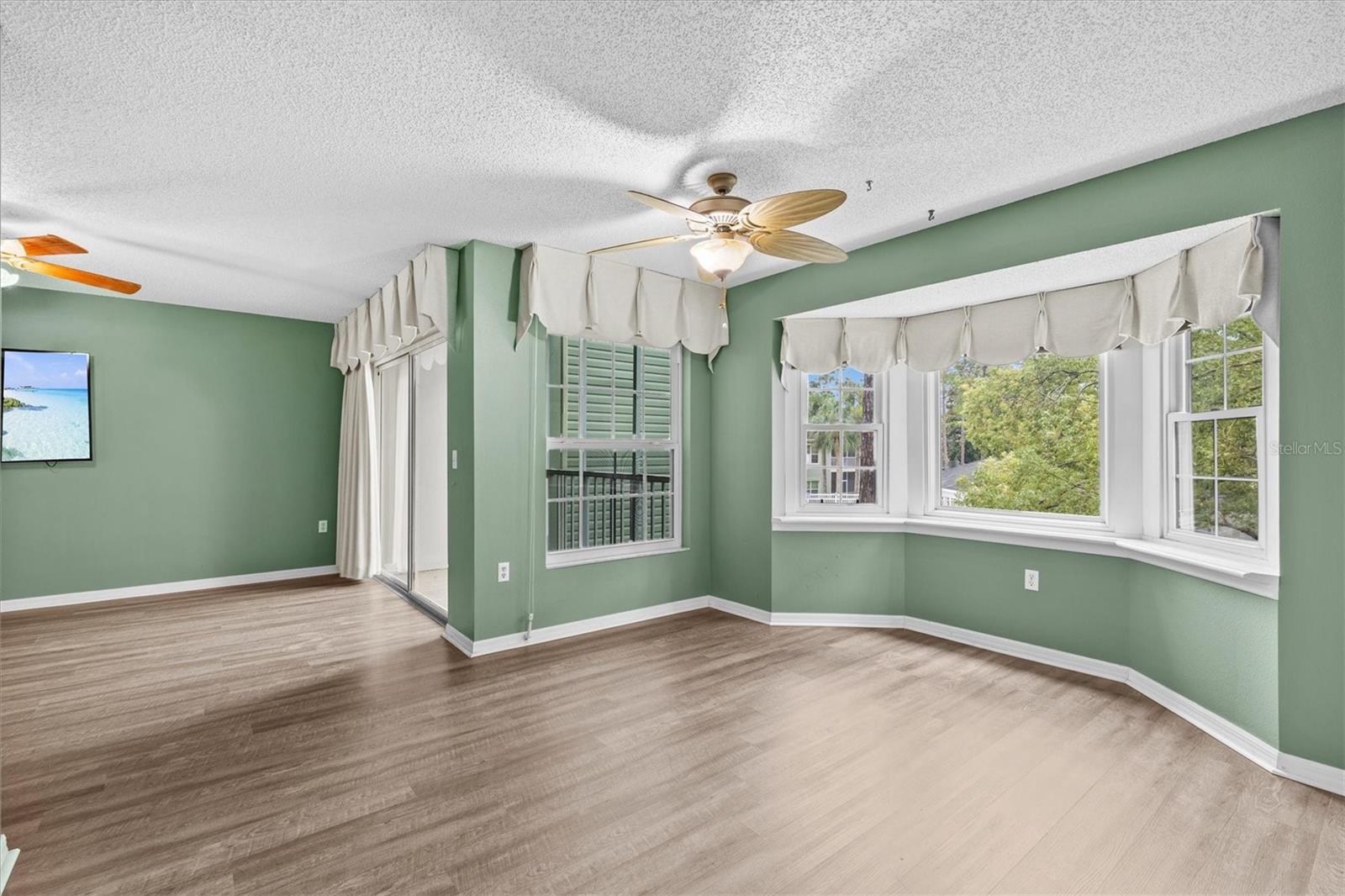 Dining room with bay window for more space and natural light.