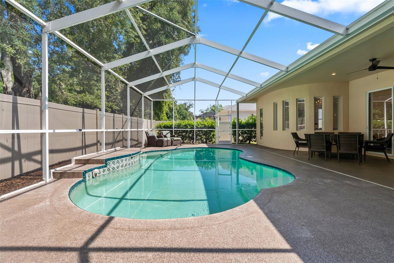 Full privacy surrounds the pool