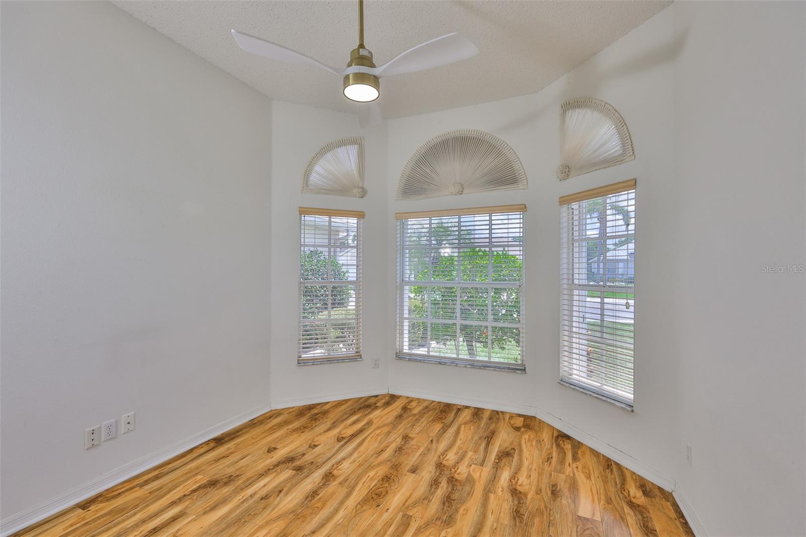 Den/study/office with bay window and new ceiling fan!