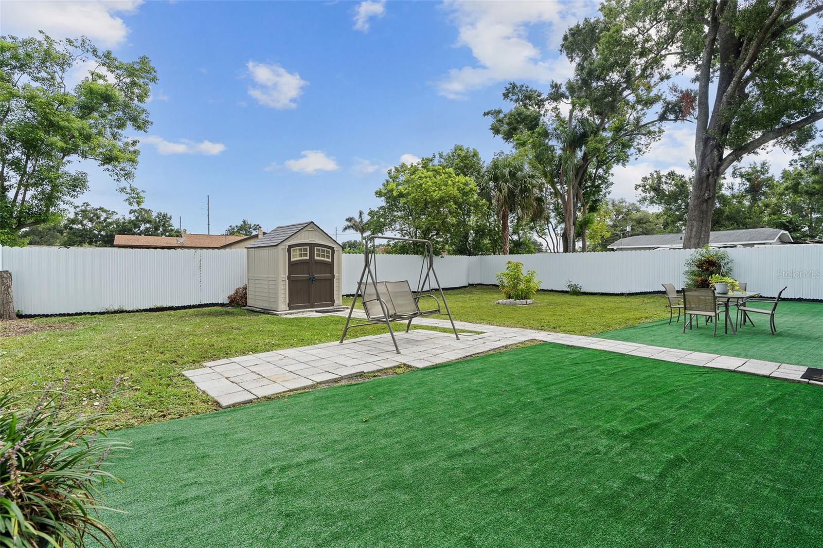 Clean and low maintenance backyard.