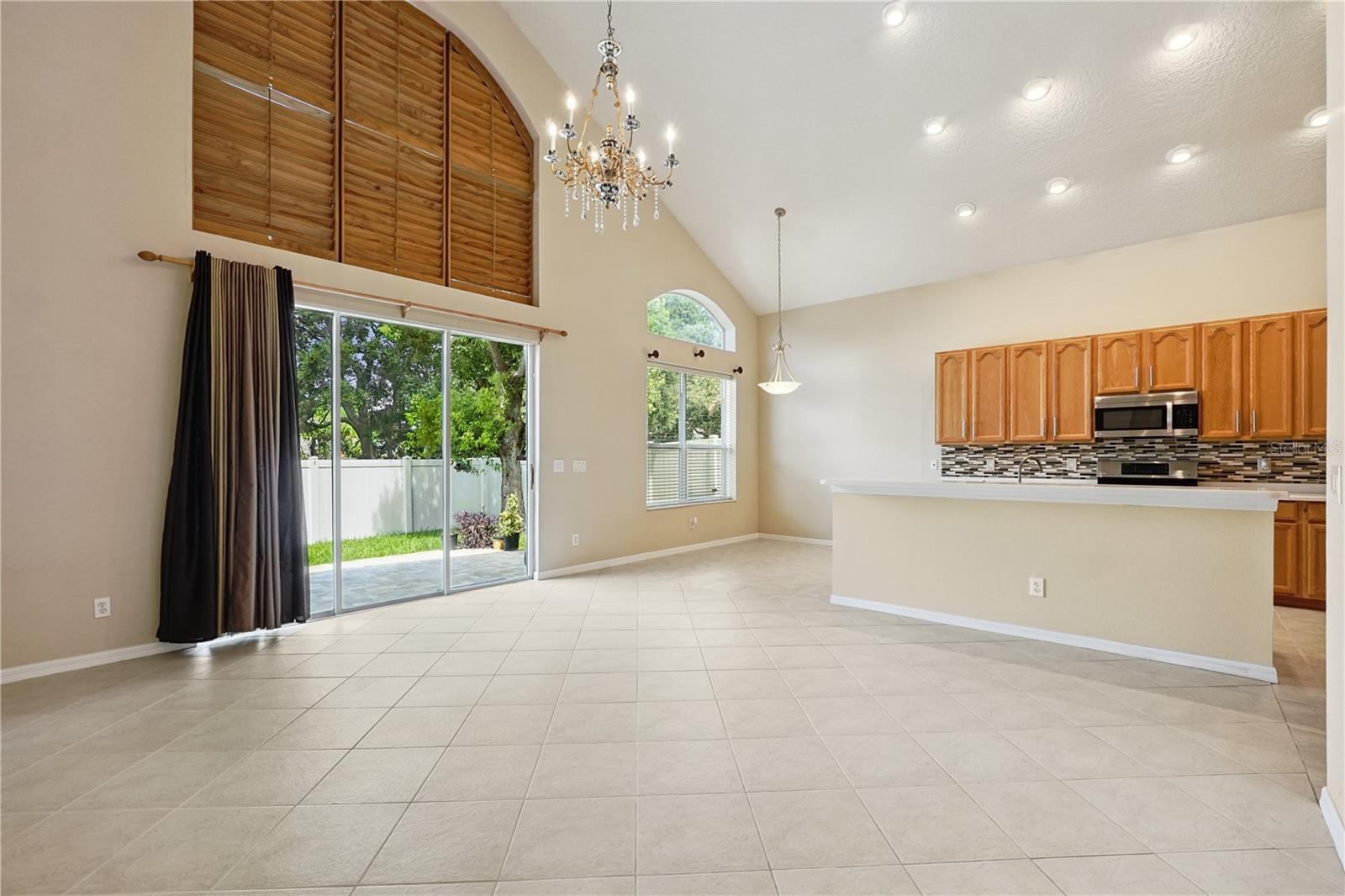 Open floorplan and custom shutters in the family room