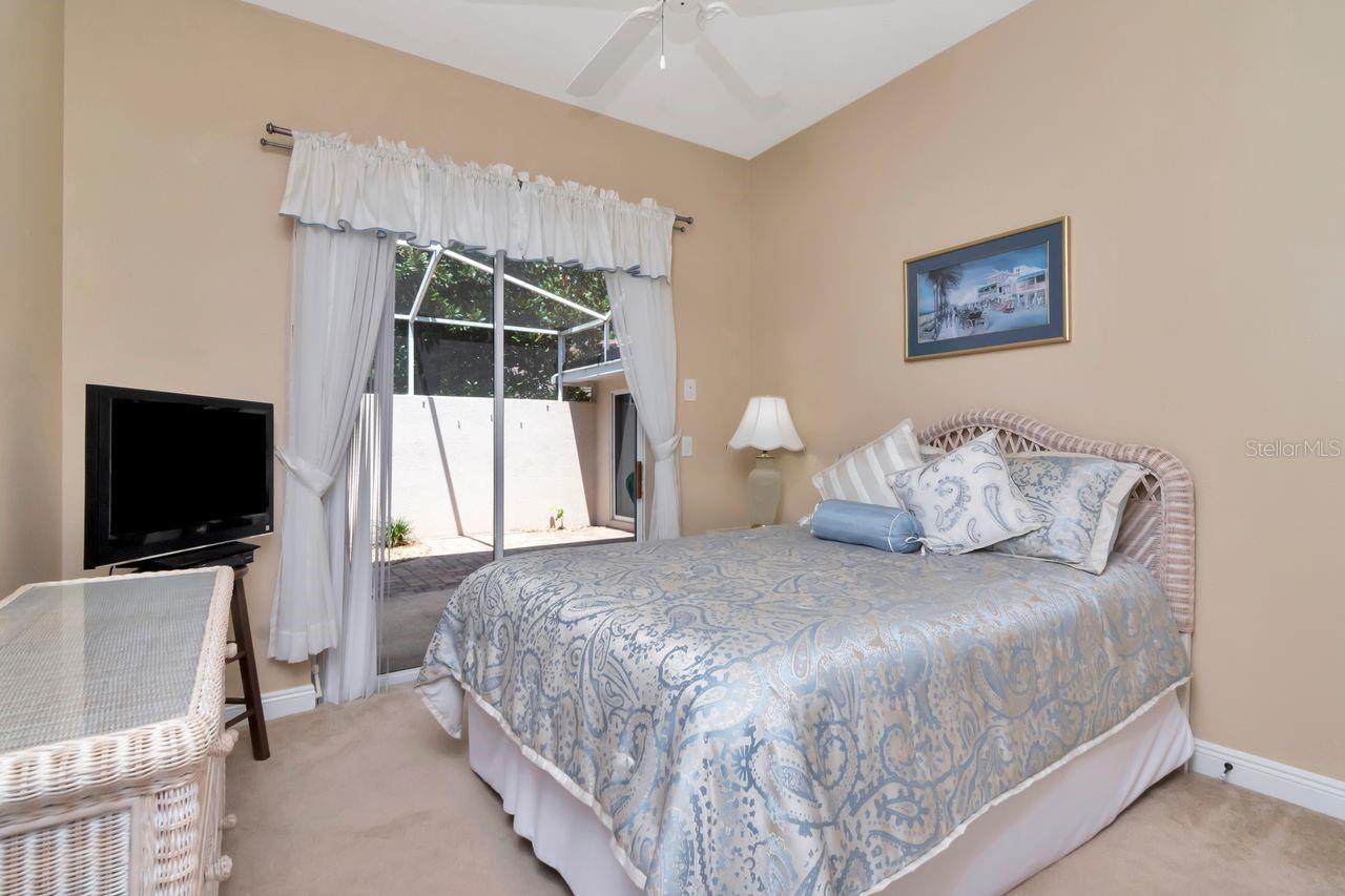 Bedroom 2 with entry to courtyard