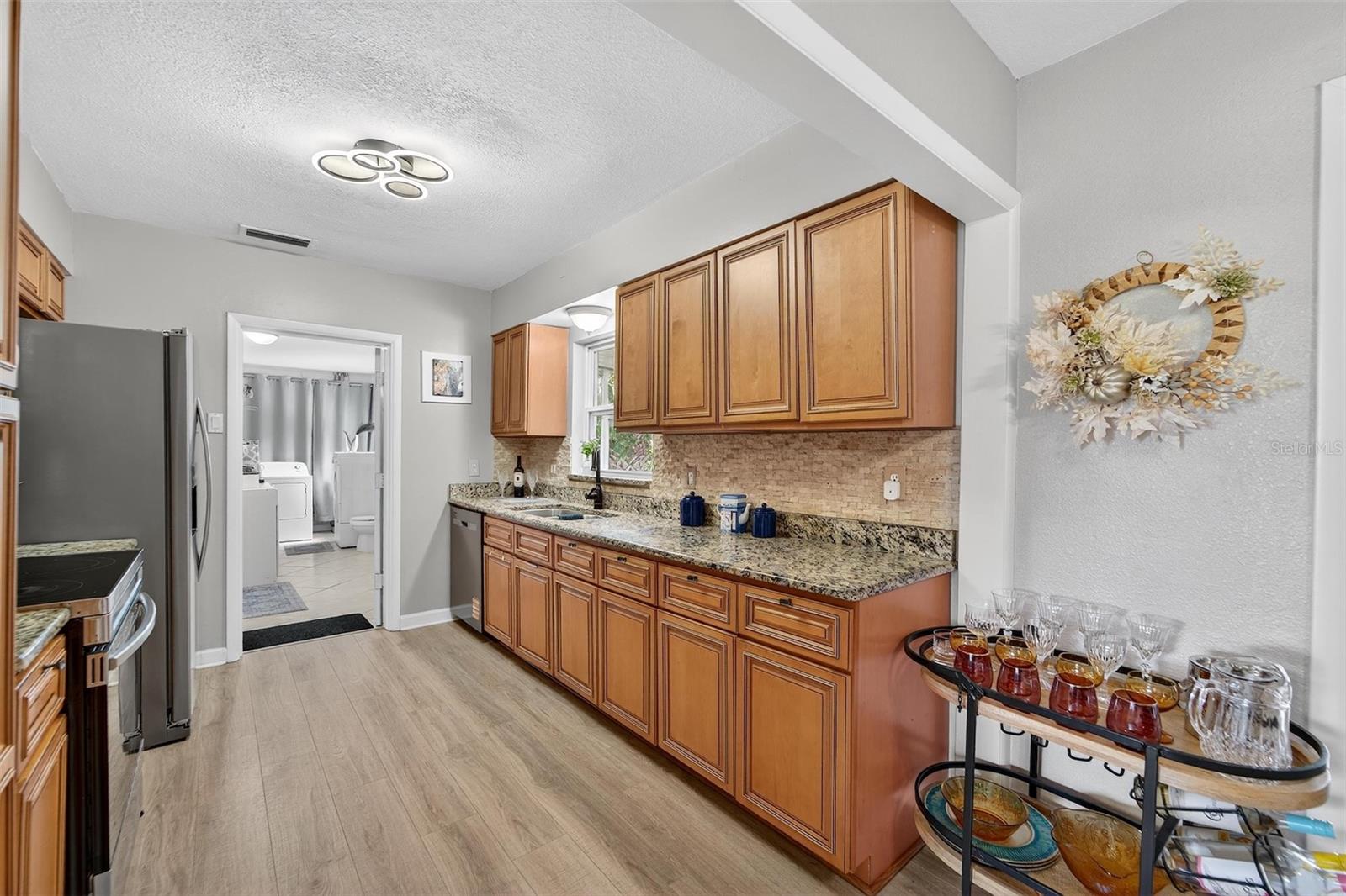 Neutral cabinetry complements a clean, classic design—easy to personalize