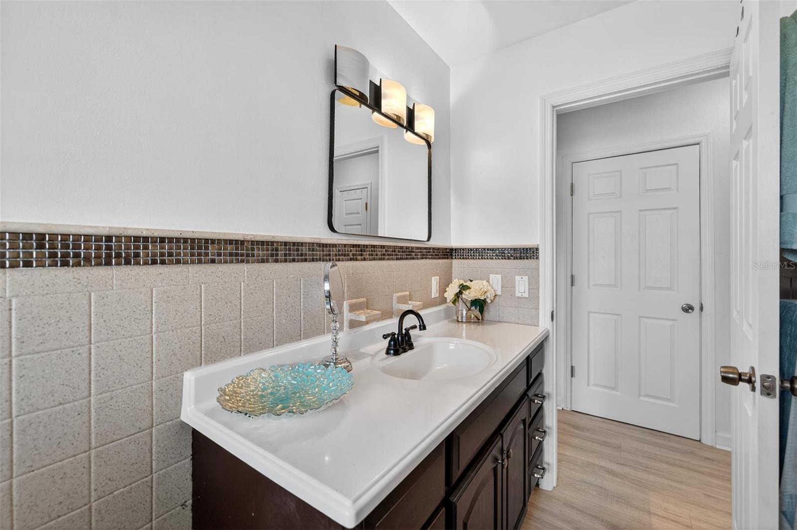Bright and clean second bathroom stylish vanity—ideal for guests or daily use