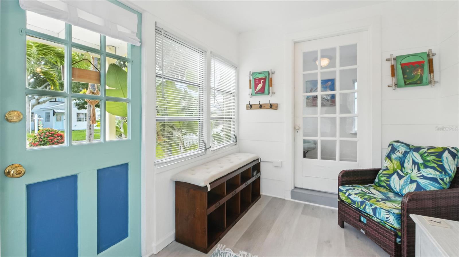 Greeted by an adorable enclosed patio