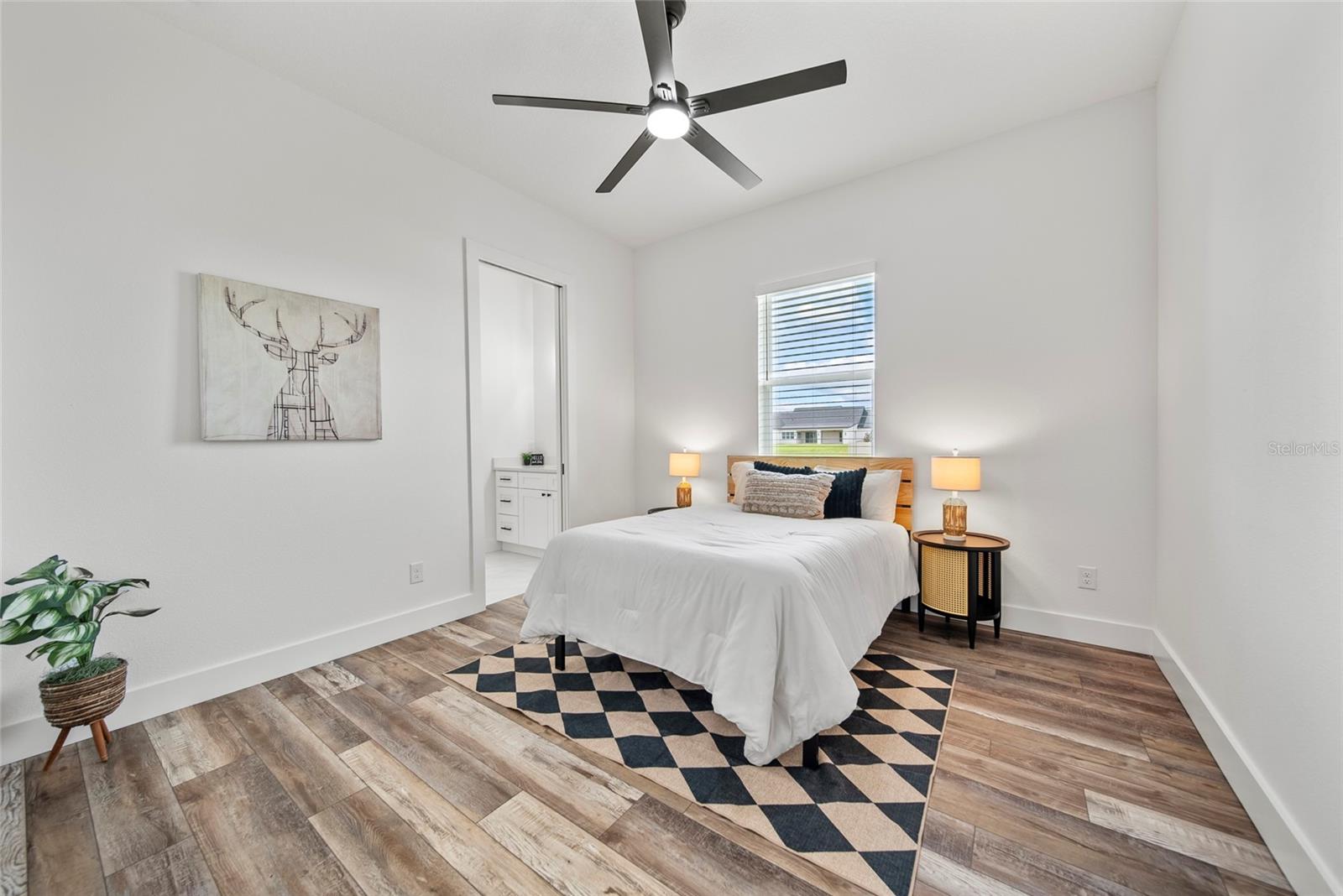 bedroom 3 with walk in closet