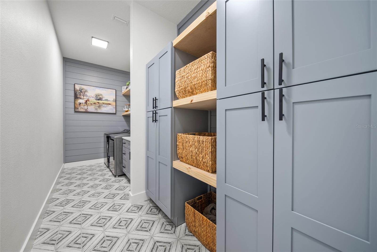 laundry room with custom built ins