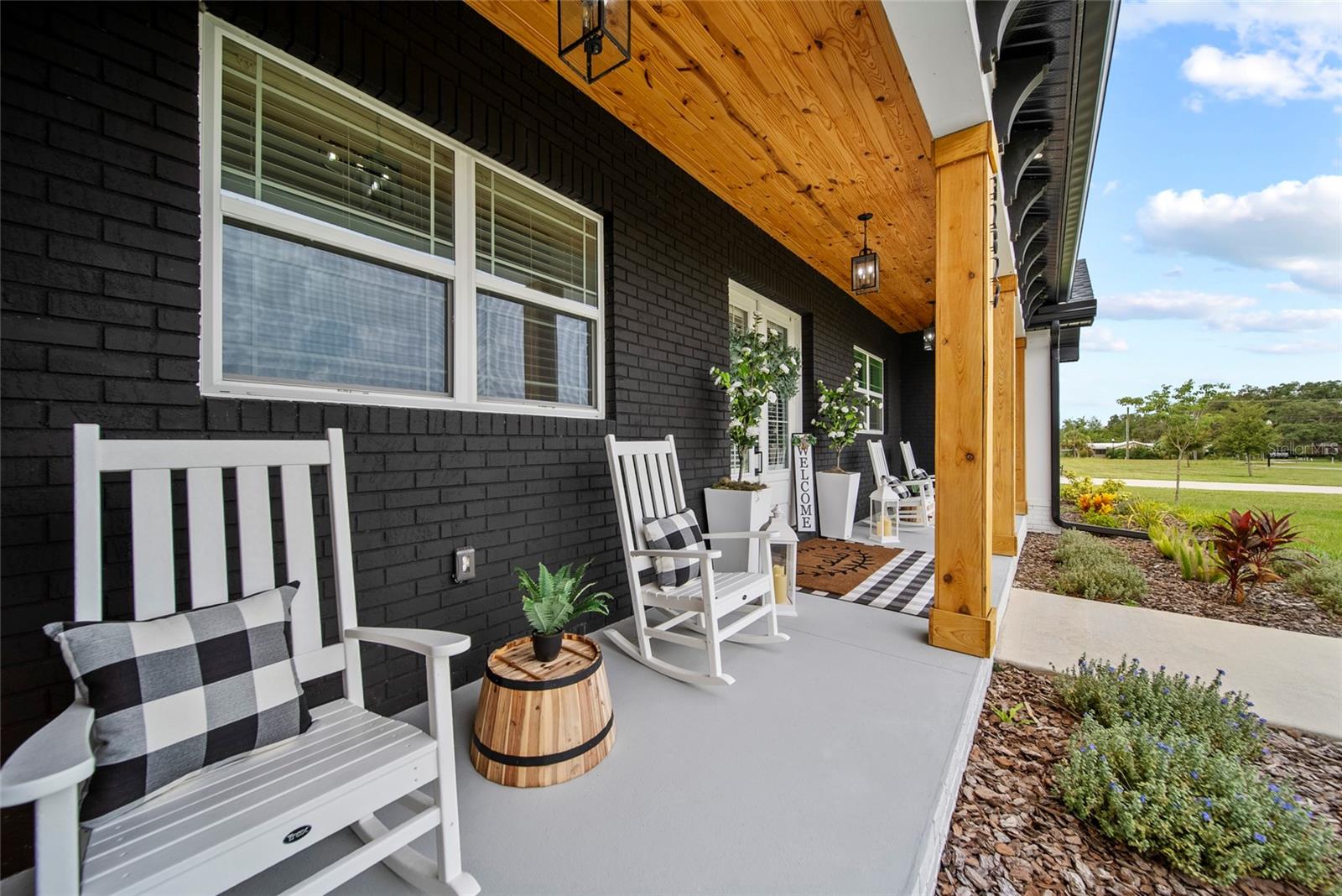 extended covered front porch with tongue & groove ceiling