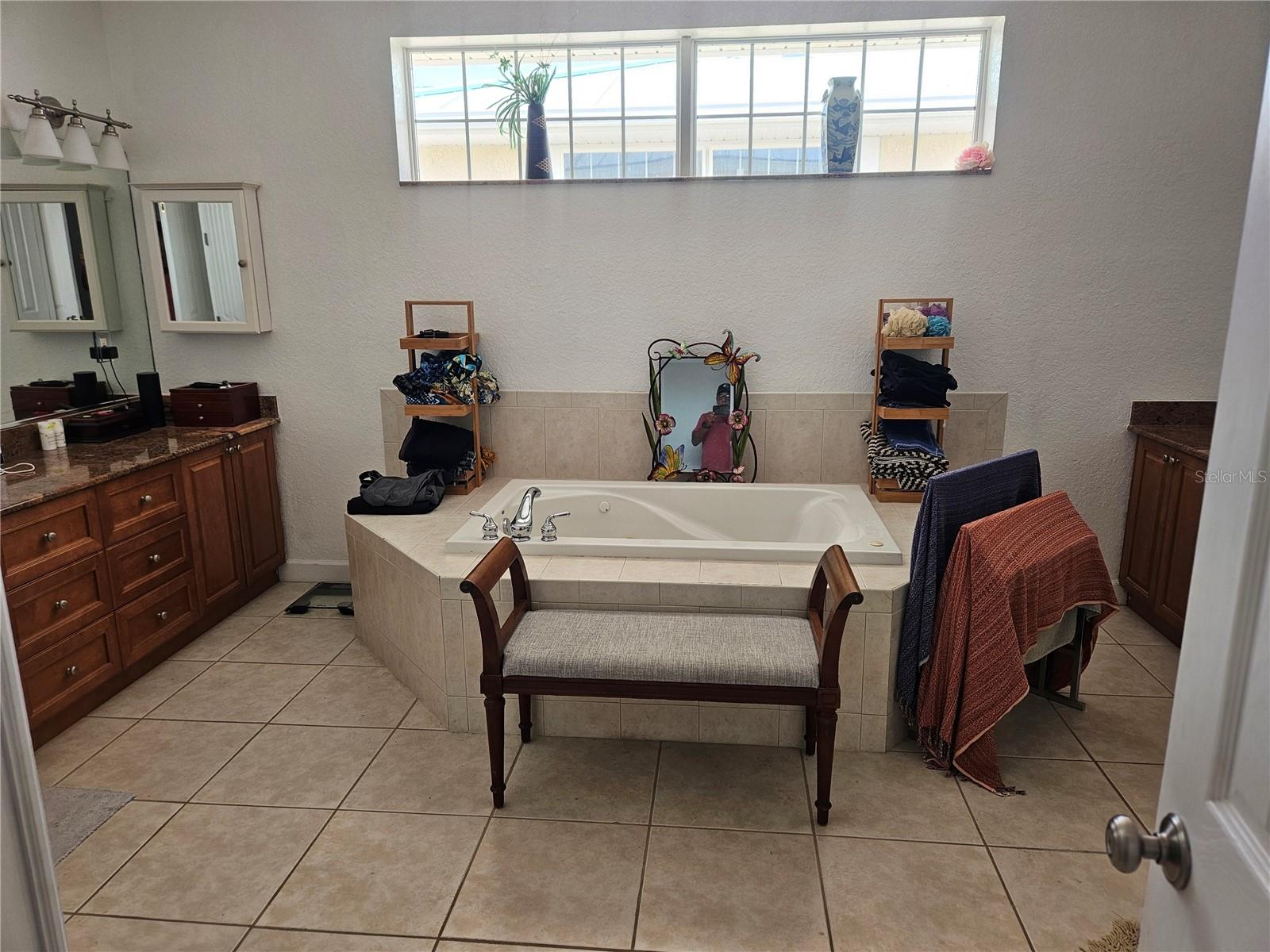 Primary Bedroom with doors to third story Balcony.