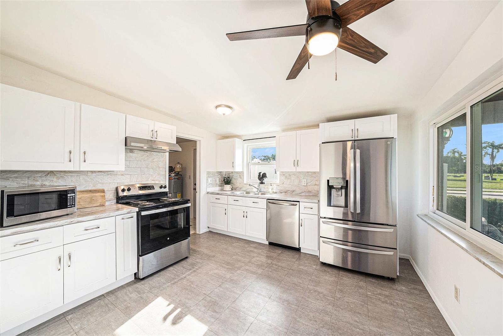 Wow! Updated, eat-in kitchen is light and bright.