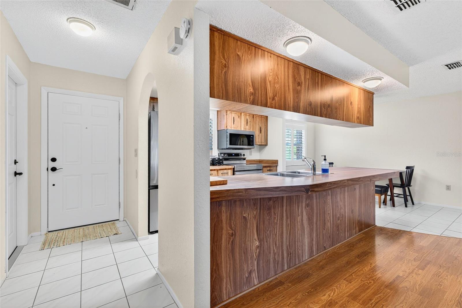 Front entry and kitchen