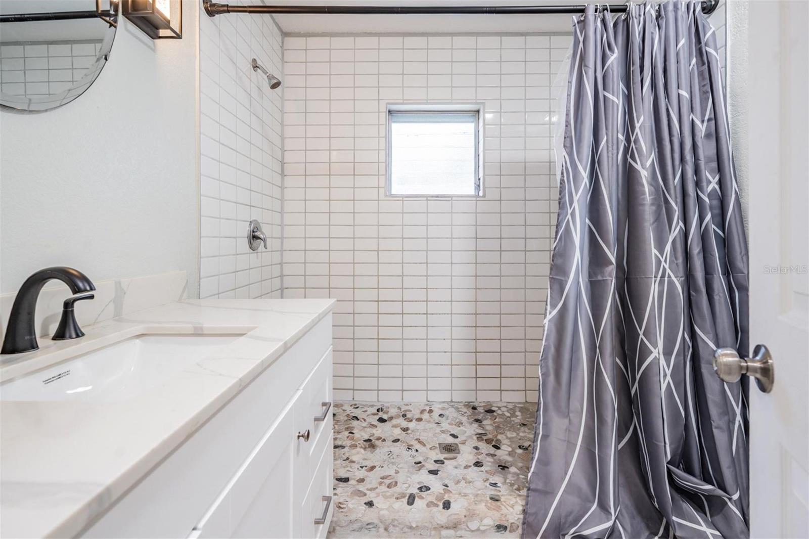 Bathroom 2 / Utility Room with Laundry