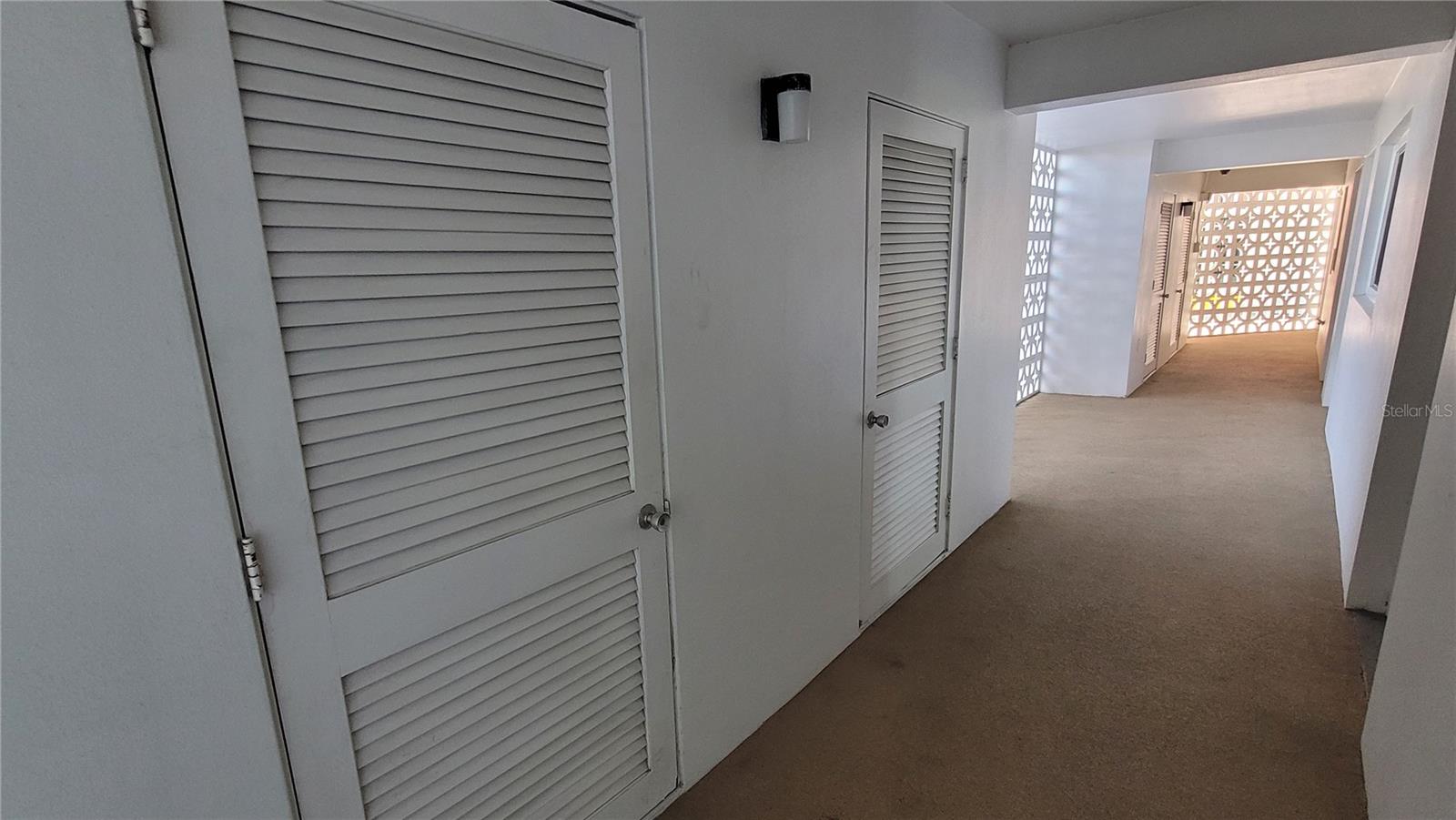 Two storage closets right outside your door!